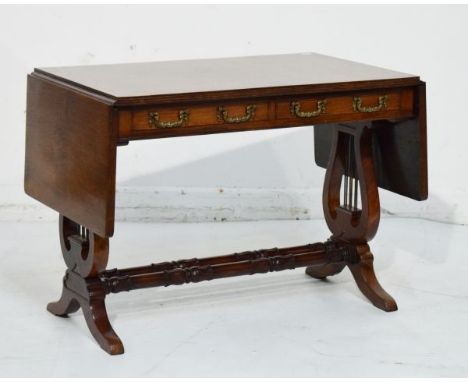 Reproduction mahogany drop leaf coffee table in the design of a sofa table   Condition: 