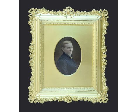 Late 19th Century over painted print - Portrait of a lady, in a fine early 20th Century gilt gesso framed picture frame withi