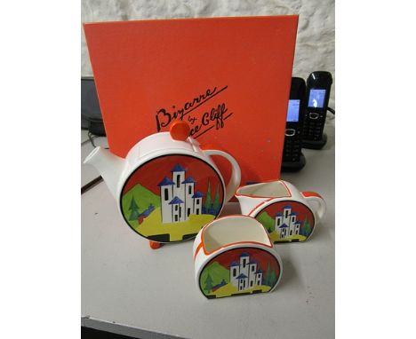 A boxed Clarice Cliff Bizarre Bonjour tea set by Wedgwood