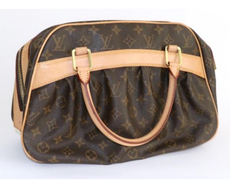 Louis Vuitton Mitzi Monogram Handbag, gathered sides, light tan mounts and handles, red fabric lining, 35cm by 23cm by 13cm, 