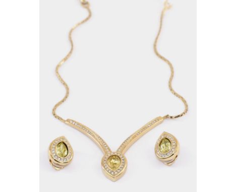 A Christian Dior Paste Necklace and Earring Set, the necklace with a V-shaped front with a pear-shaped yellow paste and pavé 