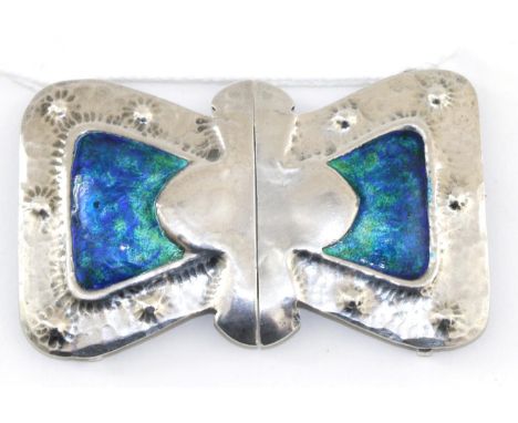 A Liberty & Co Silver and Enamel Buckle, in the form of a bow, with hammered decoration with a blue and green enamel centre, 