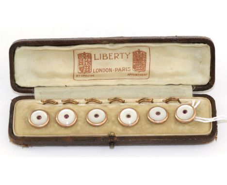 A Cased Set of Six Mother-of-Pearl and Paste Dress Buttons, cased by Liberty, mother-of-pearl discs with a central red pasteT