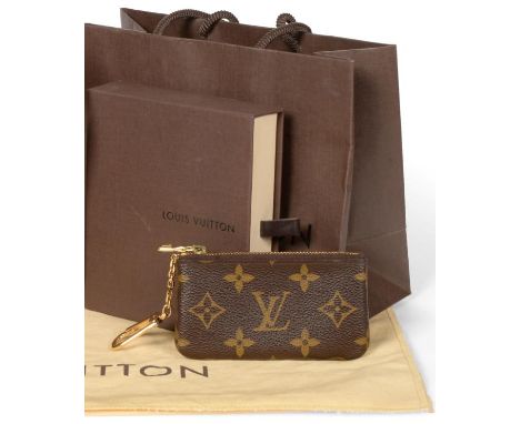 Louis Vuitton Monogram Coin Purse, on gilt metal chain and bag clip, 11.5cm by 6.5cm, with original box, dustbag and purchase