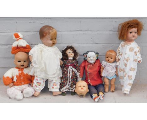 { Group of lots:  1130, 1131, 1132 } A group of papier mache and bisque faced dolls, all unmarked. (AF, 1 box)