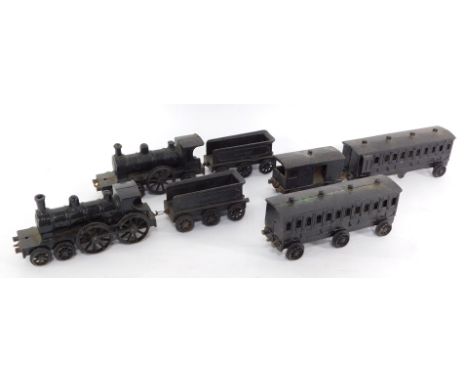 A Wallworks Patent cast iron floor express train, one locomotive bearing date for 1892, comprising two locomotives and tender