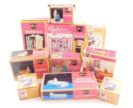 Sindy accessories, boxed, comprising bed and bed clothes, wash basin, wardrobe, rocker, lounge set, wall oven, chest of drawe