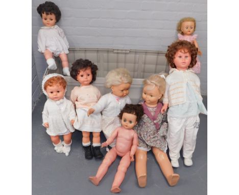 A large quantity of large dolls, all plastic bodied, unmarked, some with speech boxes. (1 garden storage trunk) 