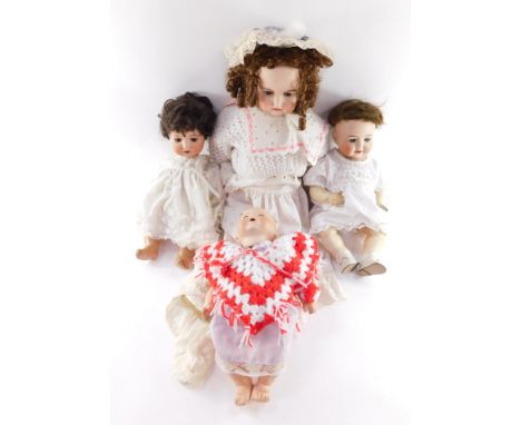 An Armand Marseille bisque head baby doll no. 351/4, Simon and Halbig bisque head crying doll no. 126 and two further bisque 