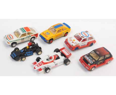 Five Scalextric rally and racing cars, together with Hornby Brabham racing car (6).