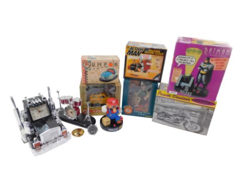 Seven collectable clocks, comprising a Batman Animated Series illuminated talking alarm clock., Snow Tigers clock., Super Mar