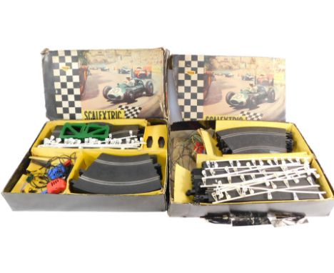 Two Scalextric model motor racing sets, lacking cars, boxed. (AF)