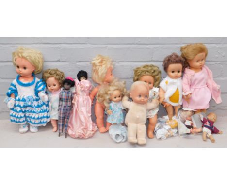 A small group of dolls, to include a plastic headed Mattel and material bodied baby, various other plastic dolls, etc. (1 box