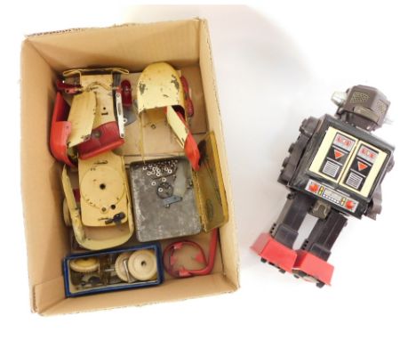 A Japanese mid century battery operated tin plate robot, together with a Meccano motor car, part assembled, outfit no.1 with 