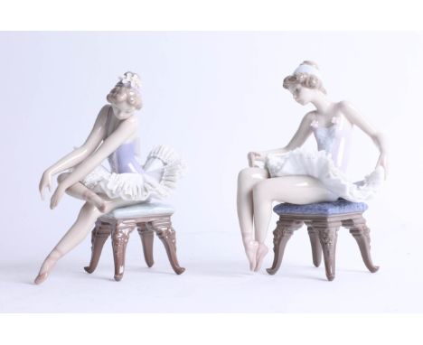 Lladro, a pair of seated ballerinas.
