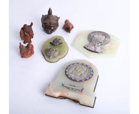 Three carved wood netsuke, three Italian onyx plaques, mounted with white metal portraits, Rosa Mystica.