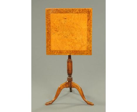 A 19th century burr maple tripod table, with snap action and turned column. 44 cm x 45 cm. 