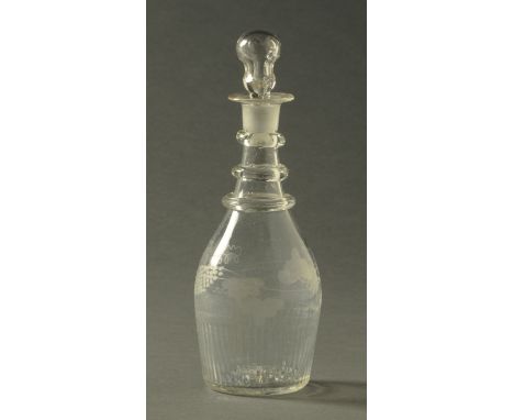 A Georgian engraved decanter, with three ring neck.  Height 22 cm.