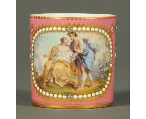 A Sevres porcelain coffee can, with Pompadour pink ground decorated with a print of a courting couple.  