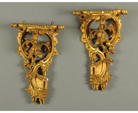 A pair of composition Chinoiserie wall brackets, in the Chinese Chippendale style.  Height 35 cm.  CONDITION REPORT: These ar