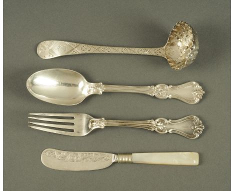 A George IV silver sifting spoon, with later Victorian berry embossing, London 1825, a Victorian spoon and fork, London 1842 