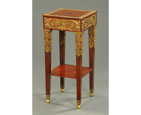 A 19th century French stand, with fine ormolu mounts, square form, with tapered legs, low shelf and capped feet.  Width 39 cm