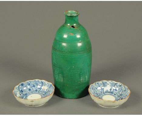 A pair of Chinese Kangxi bowls, each with six character mark, diameter 16 cm, and a green glazed vase, height 33 cm.  