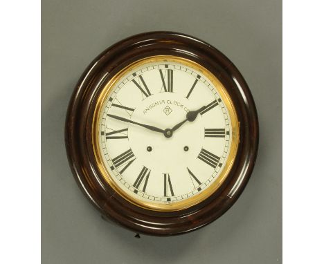 An Ansonia Clock Company circular wall clock, with brass bezel and eight day striking movement.  Diameter 41 cm. 