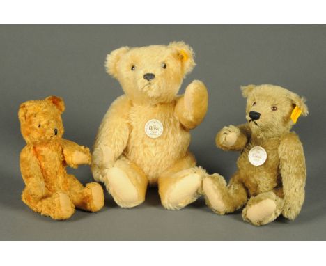 Two modern Steiff Teddy bears, and a small vintage Teddy bear.  Largest height 32 cm. 