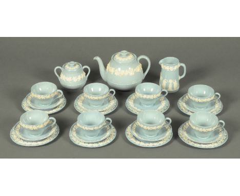 A Wedgwood embossed Queens Ware tea service, teapot, sucrier, milk jug, 8 cups, 6 saucers, 2 slightly larger saucer and 8 pla