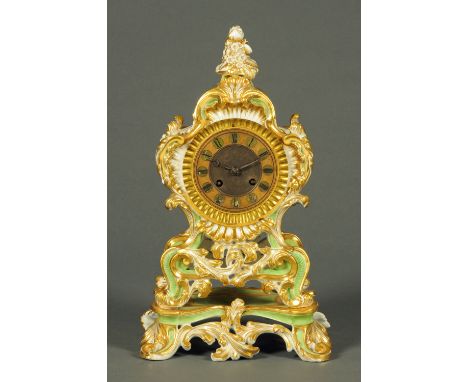 A 19th century French porcelain mantle clock, the movement bearing stamp "Paris 1823".  Height 37 cm. 