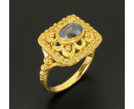 A 14 ct gold ring, set with a pale amethyst coloured stone, size J/K (see illustration).