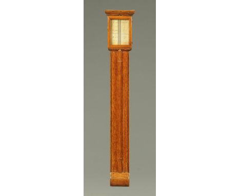 A George III oak stick barometer, with paper label "The Great Barometer".  Height 87.5 cm (see illustration). 