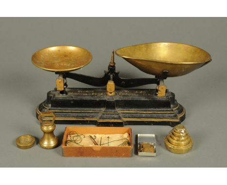 A set of Parnall & Sons of Bristol balance scales, with weights, and a boxed set of small balance scales.  