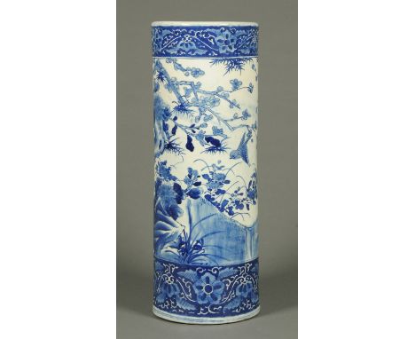 A Chinese blue and white stick stand, decorated with birds and foliage.  Height 60 cm. 