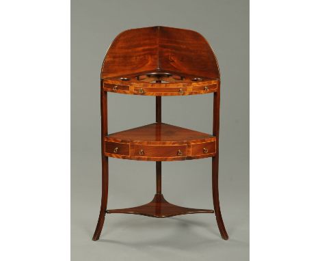 An early 19th century mahogany corner washstand, with single drawer and raised on splayed legs.  Width 58 cm.  CONDITION REPO