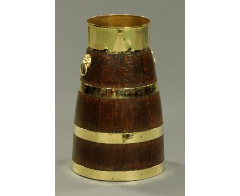 A brass bound barrel form stick stand.  Height 55 cm. 