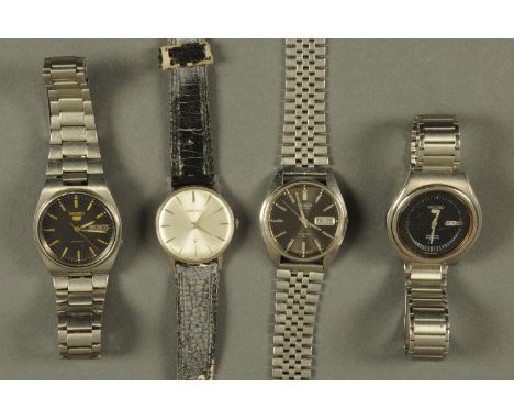 Four vintage Seiko gentleman's wristwatches.