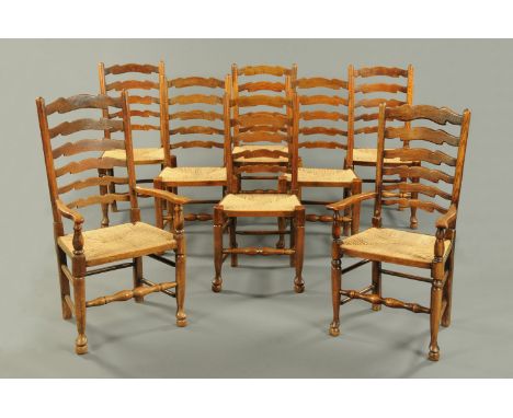 A set of two carver arm and six single oak Lancashire ladder back dining chairs (see illustration).