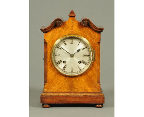 An Edwardian inlaid mahogany mantle clock, with two-train spring driven movement.  Height 35 cm. 
