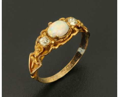 A Georgian opal and diamond ring, with gold coloured metal shank.  Size K (see illustration).