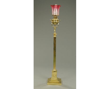 A 19th century brass lamp standard, with Corinthian column raised on a square stepped base (see illustration).  
