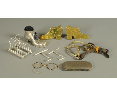 A pair of brass hearth ornaments, in the form of shoes, and a boot pin cushion, vintage spectacles, boot pulls and toast rack