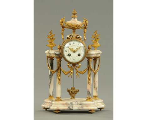 A large French ormolu and marble mantle clock, circa 1860.  Height 43 cm, width 27 cm (see illustration).  CONDITION REPORT: 