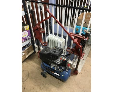 A compressor, two drill stands and a radiator 
