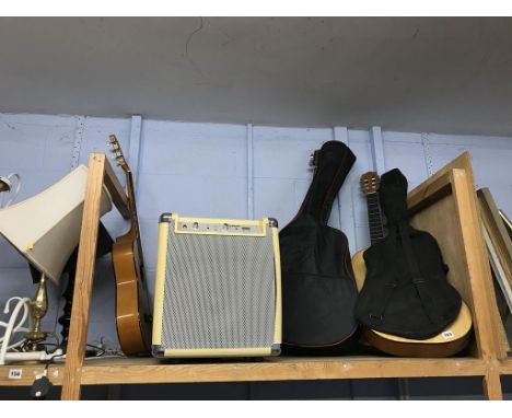 Various guitars and a speaker