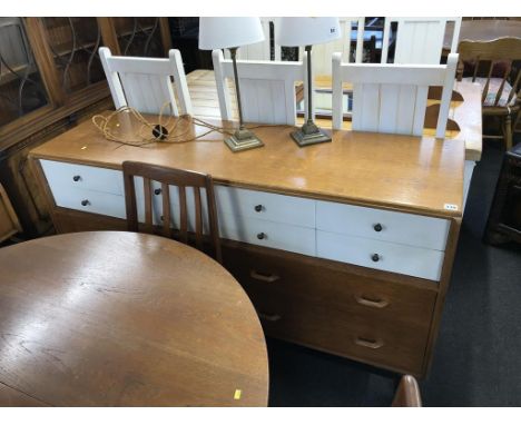A G Plan light oak sideboard, with twelve drawers