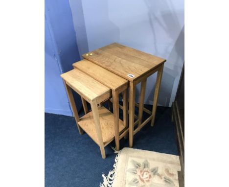 A light oak nest of tables