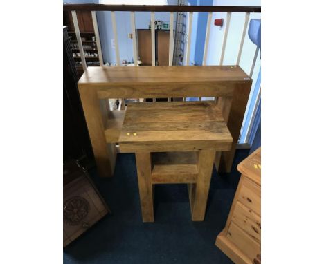 A light wood two tier side table and a rectangular table