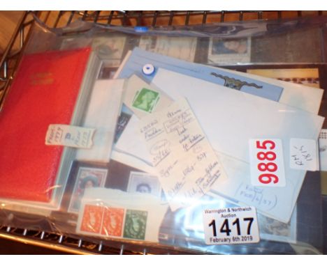 Folder containing stamps and first day covers
